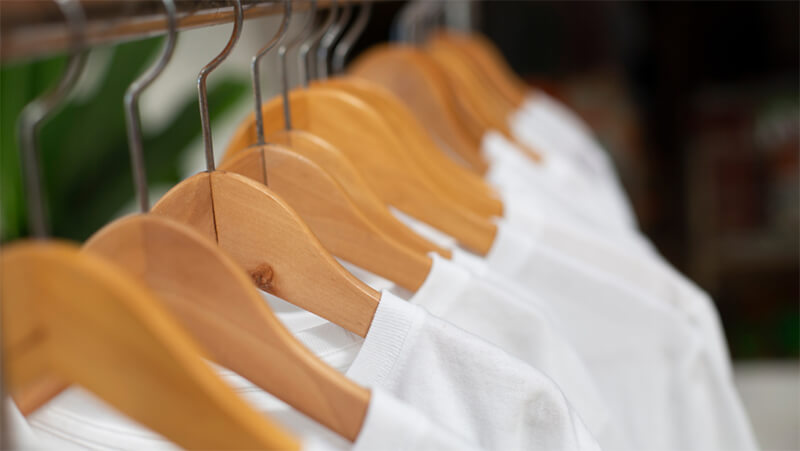 White T-Shirts on Hangers